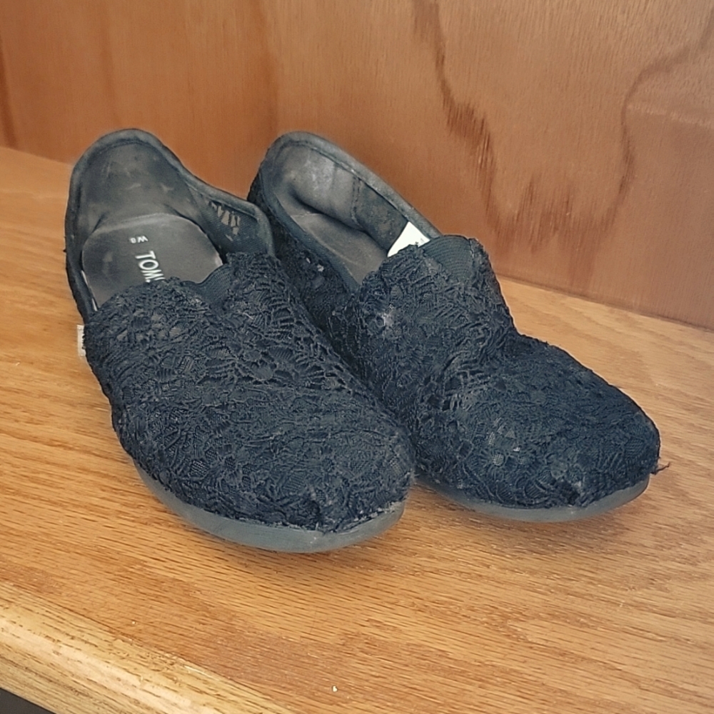 Toms black floral lace slip on shoes